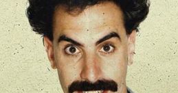 Borat, a comedic character, smiles with a quirky expression, sporting a mustache and light suit, showcasing his unique style.