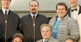 Cast of "Phoenix Nights" posing outside the venue, showcasing their unique comedic styles and camaraderie.