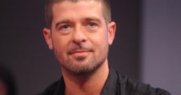 Robin Thicke Robin Thicke, a renowned American singer-songwriter, burst into the scene in the early 2000s with his