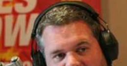 Chris Moyles engaging on-air during the Carpark Catchphrase segment, showcasing lively radio show atmosphere.