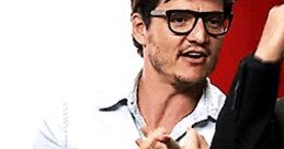 Pedro Pascal animated GIF depicting playful gestures and expressions, showcasing his charismatic and engaging personality.