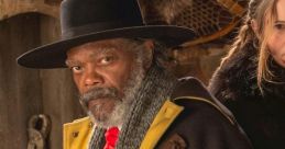 Samuel L. Jackson as Major Marquis Warren in "The Hateful Eight," showcasing a rugged Western aesthetic and intense expression.