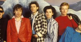 Boomtown Rats The Boomtown Rats, formed in 1975, were a legendary Irish punk rock band led by the charismatic Bob Geldof.