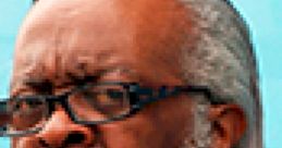 Close-up of a man with glasses and distinctive hair, expressing concern about the phrase "Rent is Too Damn High.