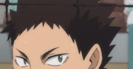 Iwaizumi Hajime from Haikyu!! focuses intensely during a volleyball match, highlighting his competitive spirit.