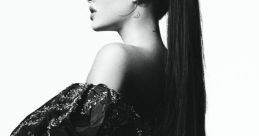 Ariana Grande poses in dramatic fashion, showcasing her album "Positions" with bold styling and striking visuals.