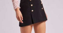 Chic black mini skirt with gold buttons, styled perfectly for Imogen's Romanian live stream fashion.