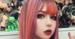 Egirl with vibrant pink and purple hair, choker, and stylish makeup, surrounded by figurines, showcasing unique style.