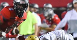 Thompson Football player evades tackle during a high-stakes game, showcasing agility and competitive spirit on the field.