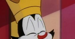 Yakko Warner, cheerful character from Animaniacs, wearing a crown and smiling, showcasing his playful personality.