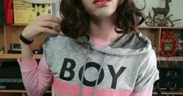 Femboy style featuring a cropped hoodie and mini skirt, showcasing bold fashion choices and playful expression.