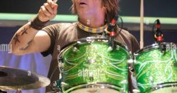 Rikki Rockett Type your text to hear it in the voice of Rikki Rockett. Rikki Rockett is widely recognized as the drummer for