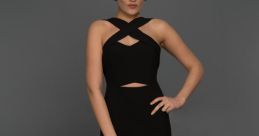 Elegant woman in a stylish black Uzun dress with cut-out details, perfect for evening events and formal occasions.