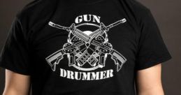 Gun Drummer Type your text to hear it in the voice of Gun Drummer. The sharp crack of gunfire pierced the air, followed by