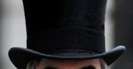 Jacob Rees-Mogg in a formal outfit wearing a black top hat, showcasing his signature style and distinctive presence.