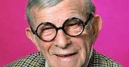 George Burns smiling with glasses, dressed in a checked suit against a vibrant pink background, exuding classic Hollywood charm.