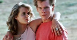 Kevin Bacon and Lori Singer share a moment in "Footloose" (1984), capturing the film's youthful energy and romance.