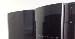 PlayStation 3 consoles side by side, showcasing the distinct designs of the PS3 Slim and original models on a wooden table.