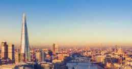 Tower Bridge spans the River Thames with London skyline in the background, showcasing iconic landmarks and vibrant city life.