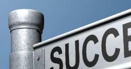 Street sign with the word "SUCCESS," symbolizing achievement and personal growth against a clear blue sky.