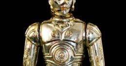 C-3PO figurine, iconic Star Wars protocol droid, showcasing shiny gold finish and detailed design against a black background.