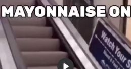 Mayonaise On Escalator When you step onto the escalator at the busy mall, the first thing you notice is the faint hum of the