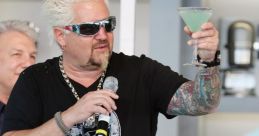 Fieri The unmistakable voice of Guy Fieri can be heard in the first clip, exclaiming, "Guy Fieri three way!" His