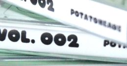 Stack of "Potatoheadz Vol. 002" featuring bold black text on white spines, showcasing unique design and creativity.