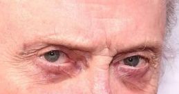 Close-up of a distinguished older man with intense eyes, showcasing a serious expression and unique features, ideal for "Another Christopher Walken.