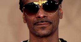 Snoop Dog Snoop Dog is a name that is synonymous with the world of hip-hop and rap. With a career spanning over three