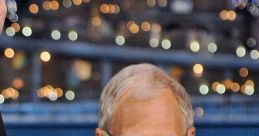 David Letterman smiling and waving during a late-night show, showcasing his iconic style and engaging personality.