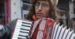 Acordion The of a solo accordion fills the air with a melancholy yet spirited melody. The rich and resonant tones of the