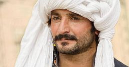 Baloch The melodic tones of the Balochi reverberate through the bustling streets, capturing the essence of Baloch