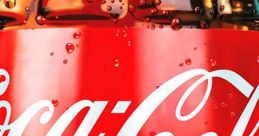 Close-up of a glass Coca-Cola bottle with droplets, showcasing the iconic logo and vibrant red color for refreshing enjoyment.