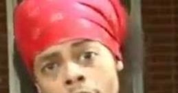 Antoine Dodson passionately delivering a message wearing a red bandana, known for the Bed Intruder viral meme.