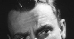 James Cagney with a serious expression, showcasing his iconic style and charisma from classic Hollywood cinema.