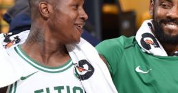 Celtics players share a moment of joy on the bench, showcasing team spirit and camaraderie during a game.