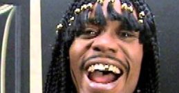 Dave Chappelle as Rick James, laughing and showcasing his iconic style from the "Prank Call" sketch. Legendary comedy moment.