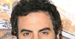 Sacha Baron Cohen attends a premiere, showcasing his role in "Borat 2". Stylish appearance with a confident smile.