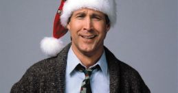 Clark W. Griswold, wearing a Santa hat, smiles while holding messy gift-wrapped presents, embodying holiday cheer.