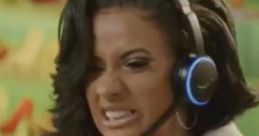 Excited female gamer in a headset expressing intense focus during a PlayStation 3 commercial advert.