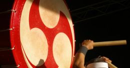 Taiko The powerful thuds of the taiko drums echo through the air, reverberating off the walls of the practice hall. Each