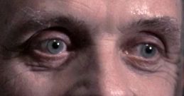 Intense close-up of Hannibal Lecter, showcasing his chilling gaze and menacing smile from Silence of the Lambs.