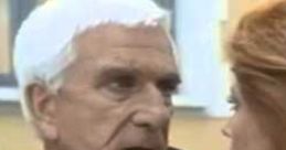 Leslie Nielsen in a tense scene from "Naked Gun," showcasing his iconic comedic style and dramatic expressions.