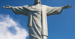 Christ the Redeemer statue towers over crowds, symbolizing faith and peace against a clear blue sky.