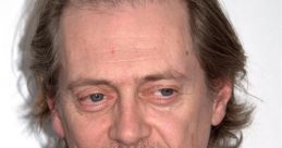 Close-up of Steve Buscemi at an event, showcasing his distinct features and signature hairstyle. Prank call humor personality.