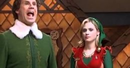 Will Ferrell as Buddy the Elf sings joyfully next to Jovie in a festive scene from the movie "Elf.