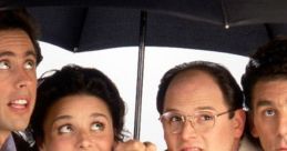 Jerry Seinfeld and friends sharing a light-hearted moment under an umbrella, showcasing friendship and humor from the iconic sitcom.