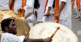 Pune Dhol The rhythmic beat of the Uladhal echoes through the streets of Pune, drawing people towards its infectious energy.