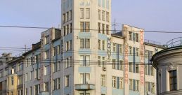 Historic Soviet-era building in Moscow, showcasing unique architecture and urban landscape near a busy intersection.